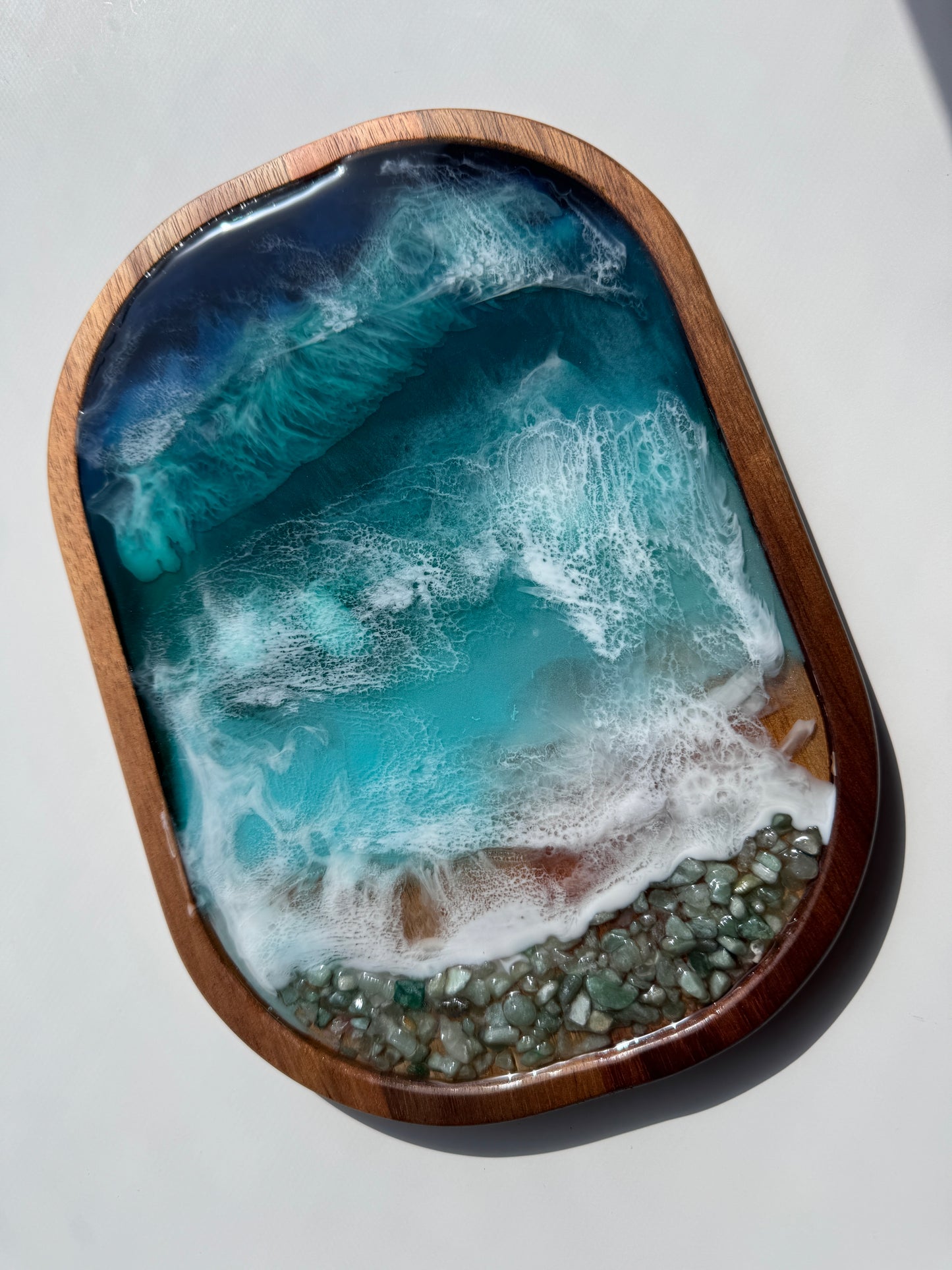 Trinket tray with green rocks